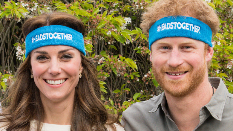 Prince Harry and Kate Middleton smiling