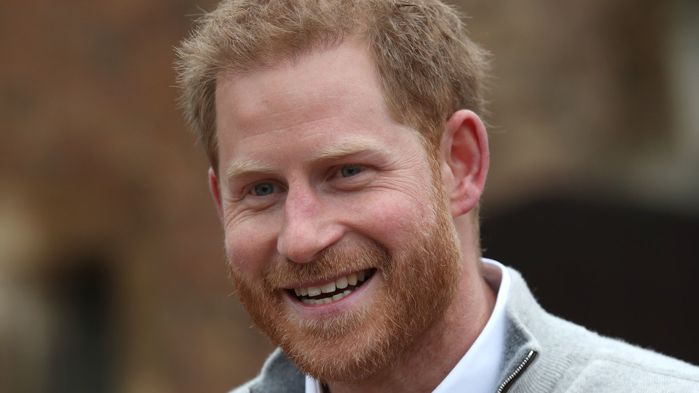 Prince Harry smiling at an event