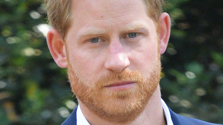 Prince Harry with a serious expression