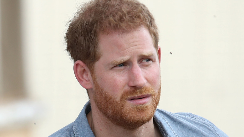 Prince Harry with a serious expression