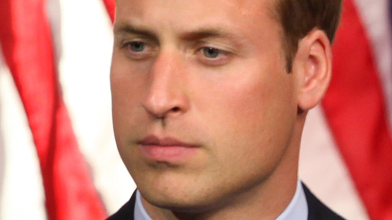 Prince William with a neutral expression