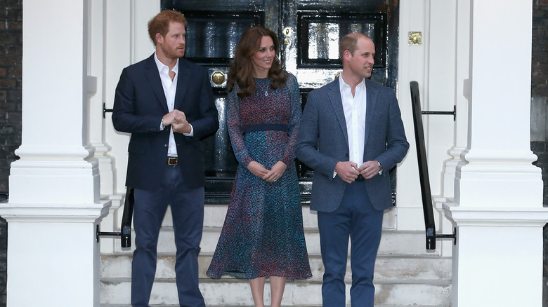 Prince Harry, Kate Middleton, Prince William posing at Kensington Palace