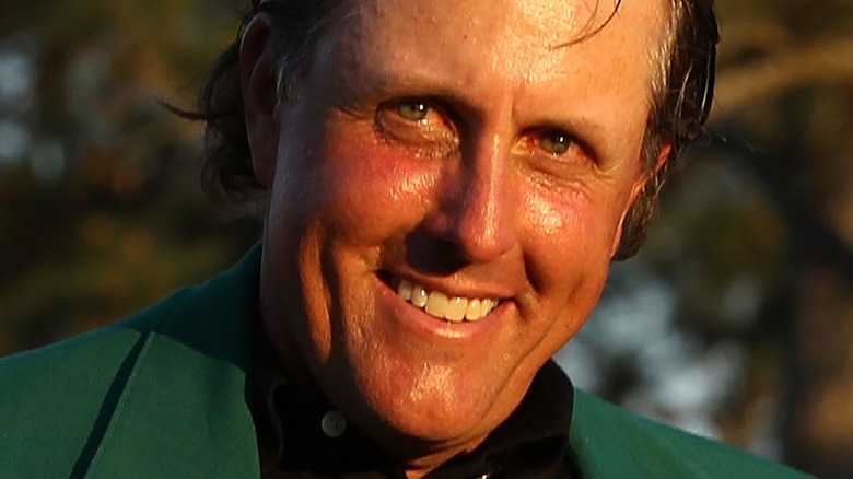 Phil Mickelson getting Masters jacket