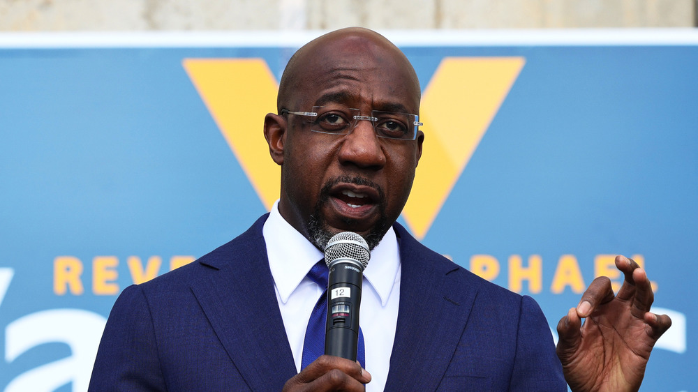 Raphael Warnock speaking at event