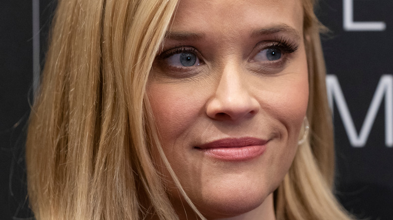 Reese Witherspoon smiles on the red carpet