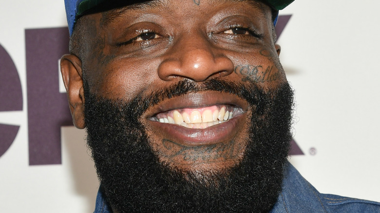 Rick Ross smiling