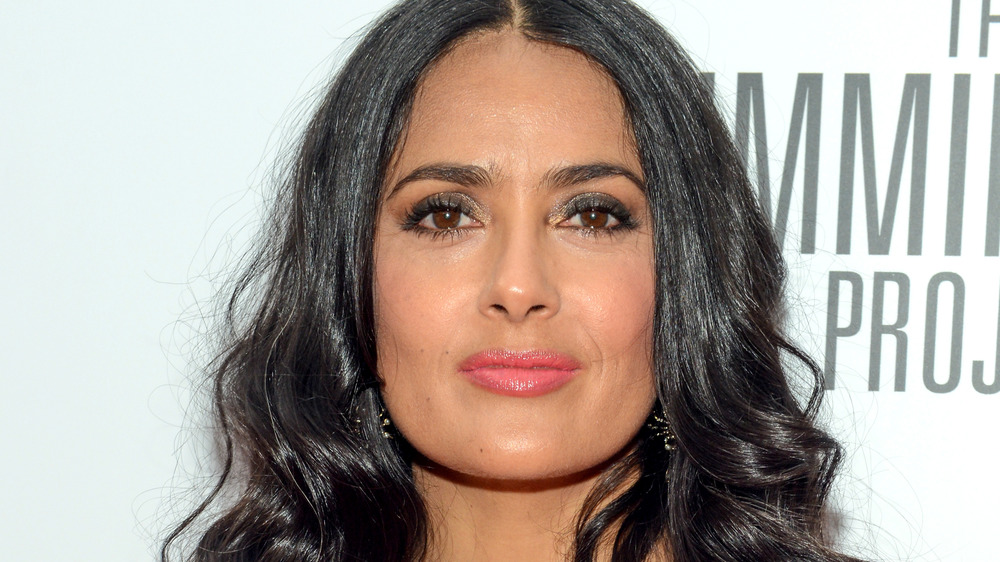 Salma Hayek posing on the red carpet at an event 