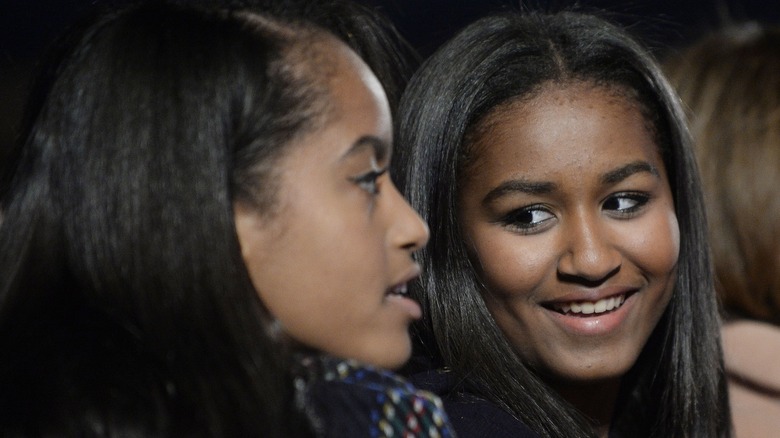 Sasha and Malia Obama talking