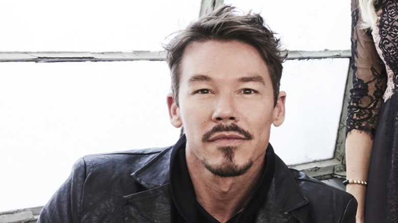 David Bromstad posing in black