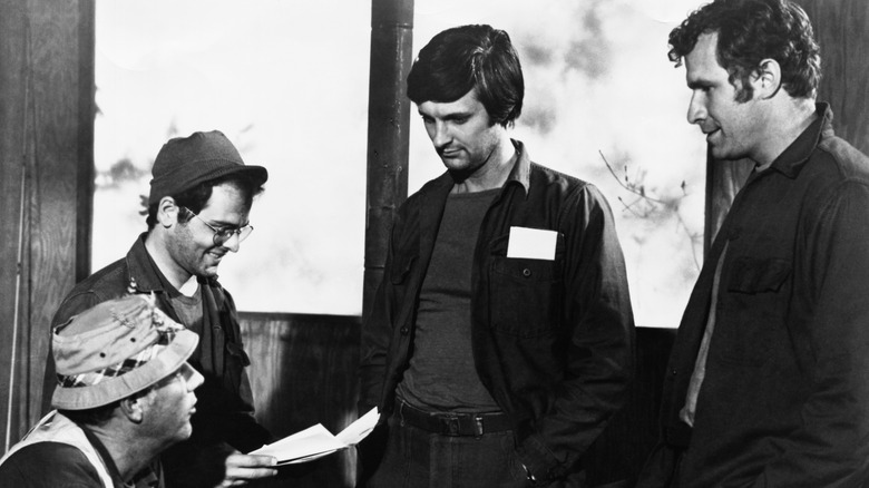 McLean Stevenson as Lt. Colonel Henry Blake, Gary Burghoff as Corporal "Radar" O'Reilly, Alan Alda as Hawkeye Pierce, and Wayne Rogers as "Trapper" John McIntyre in M*A*S*H.