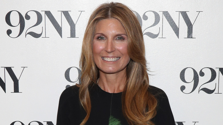 Nicolle Wallace wearing a green and black dress