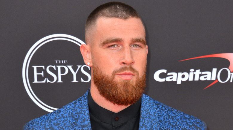 Travis Kelce in a blue blazer