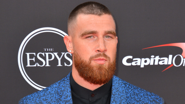 Travis Kelce in a blue blazer