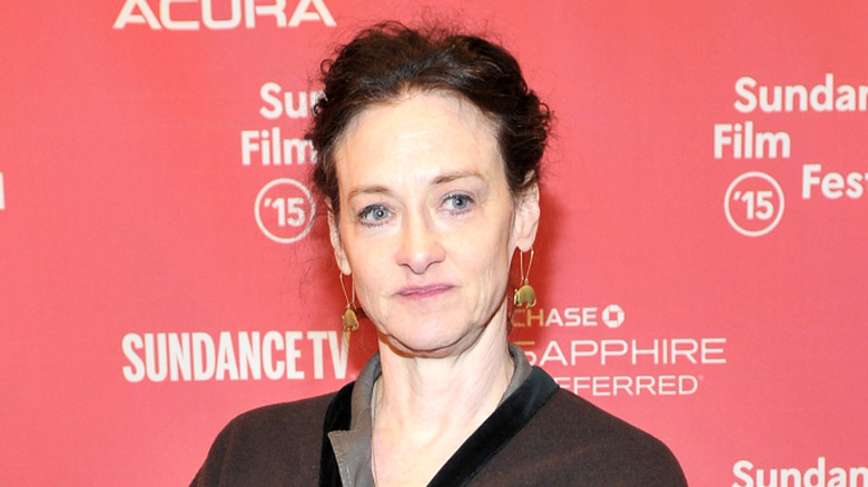 Joan Cusack smirking