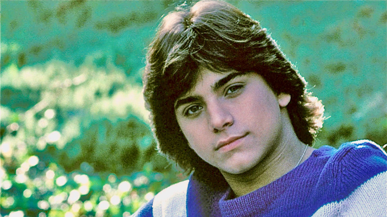 John Stamos posing for a 1982 portrait