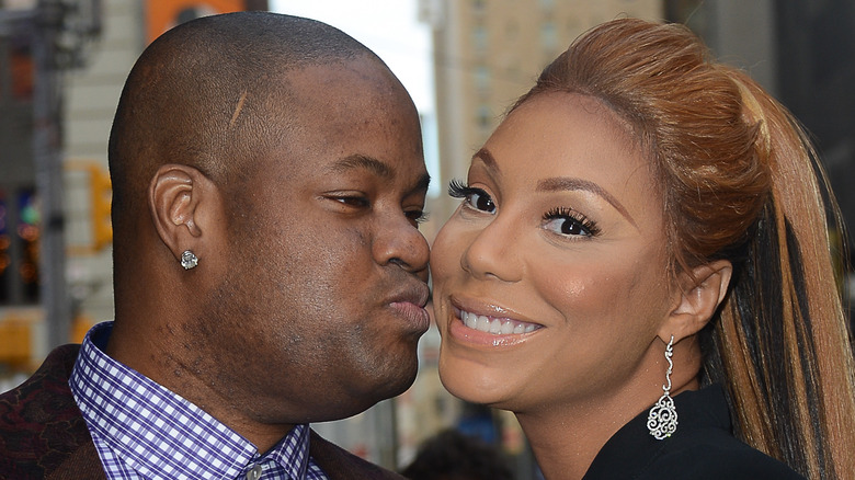 Vince Herbert kissing Tamar Braxton