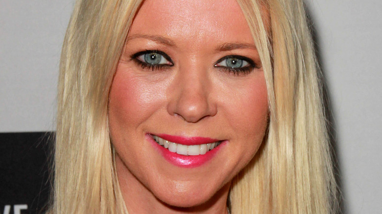 Tara Reid smiling pink lipstick