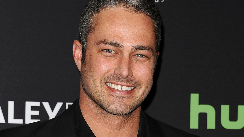 Taylor Kinney smiling 