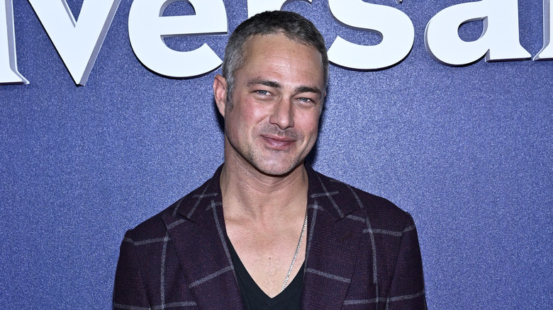 Taylor Kinney posing 