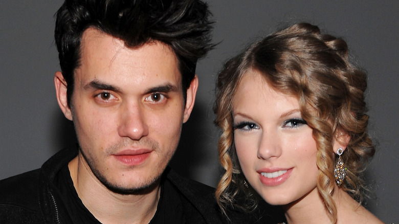 John Mayer posing with Taylor Swift
