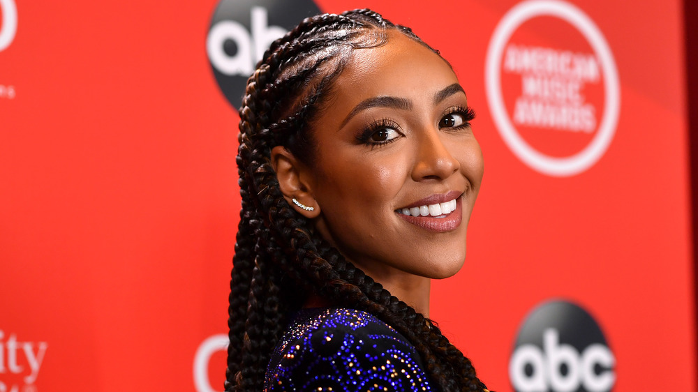 Tayshia smiling on the red carpet 