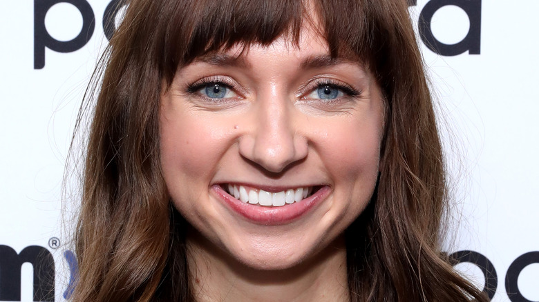 Lauren Lapkus smiling with bangs