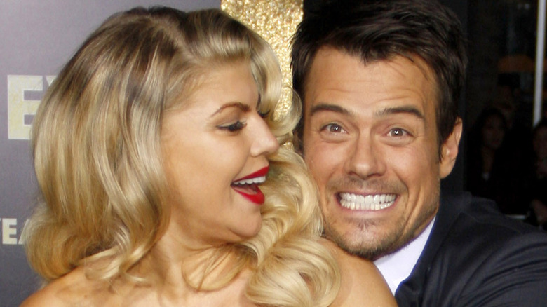 Josh Duhamel and Fergie smiling