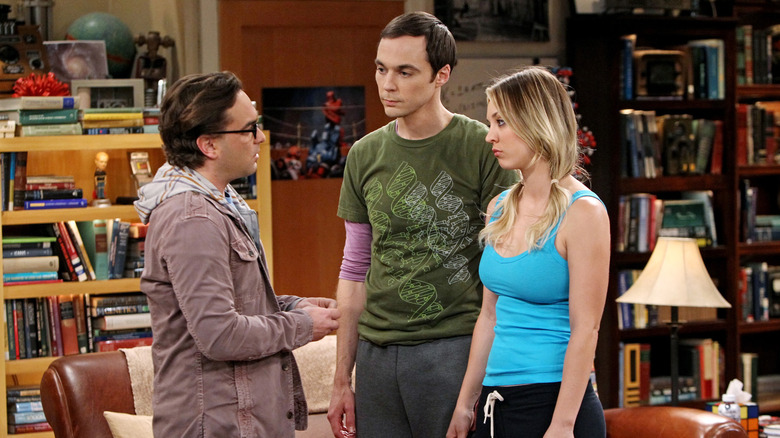 Leonard Sheldon and Penny talking in the living room on The Big Bang Theory