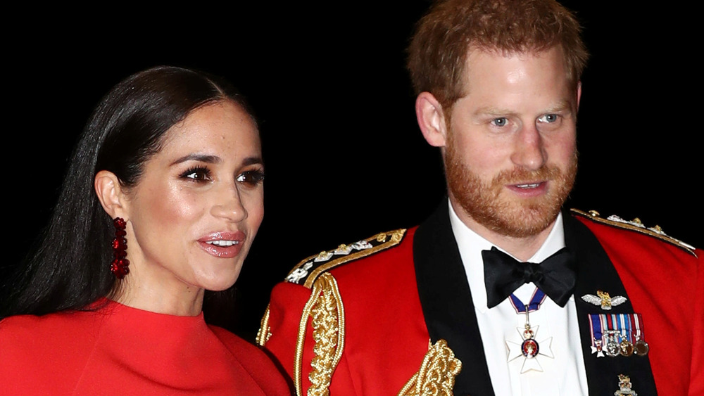 Meghan Markle and Prince Harry wear red