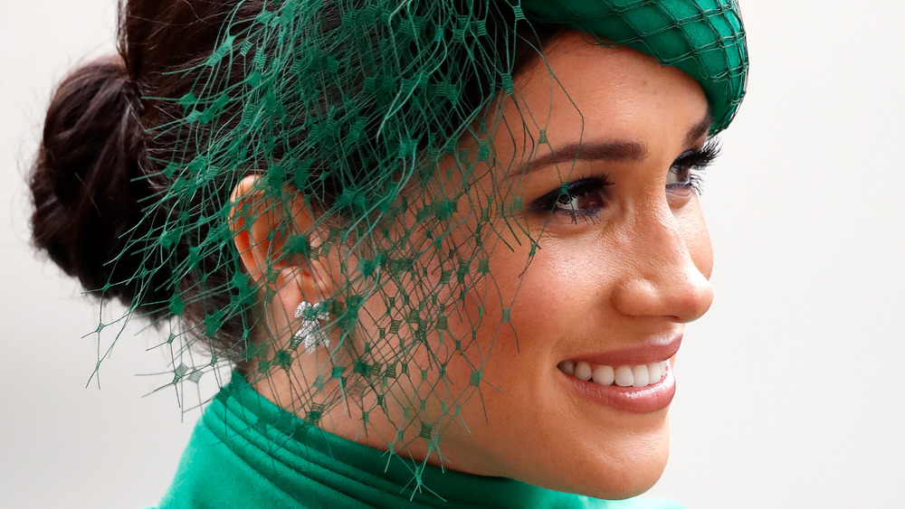 Meghan Markle smiling at a royal event