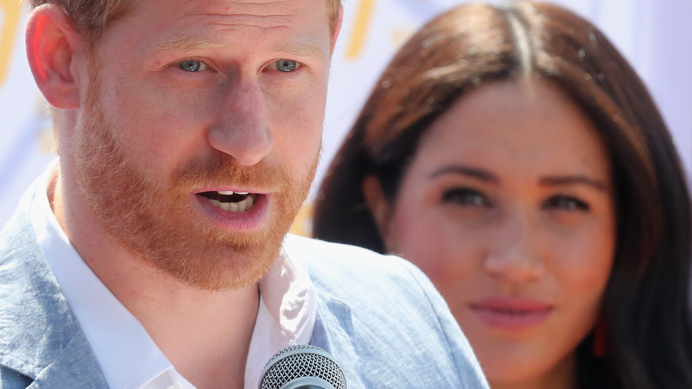 Prince Harry and Meghan Markle talking