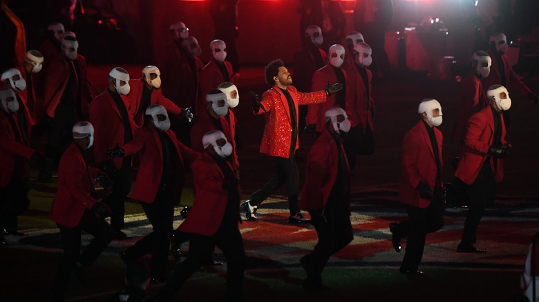 The Weeknd performs with dancers at the Super Bowl