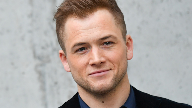 Taron Egerton smiling
