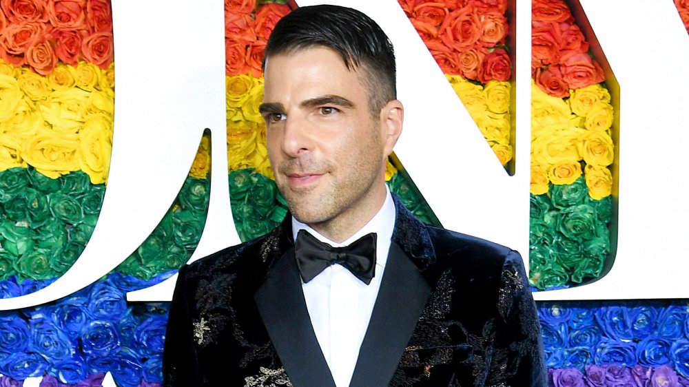 Zachary Quinto in a velvet suit and tie