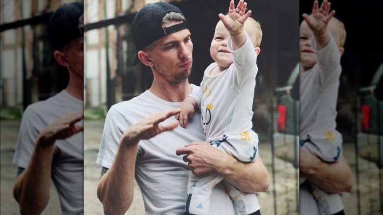 Brandon Davis with his son