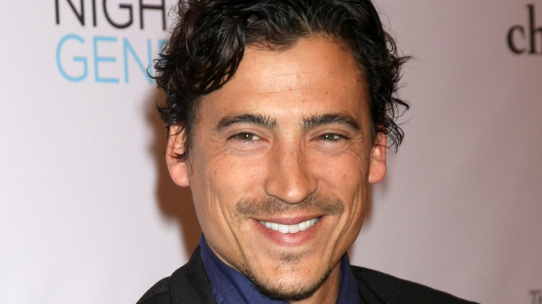 Andrew Keegan smiling on the red carpet