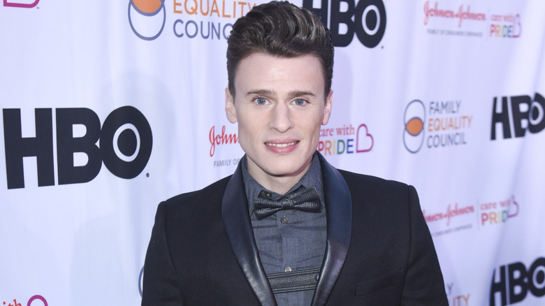 Blake McIver on the red carpet in a dark tux