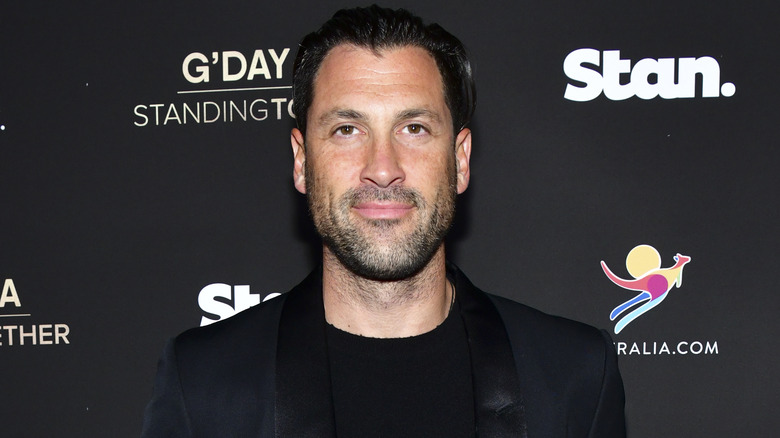 Maksim Chmerkovskiy smirking