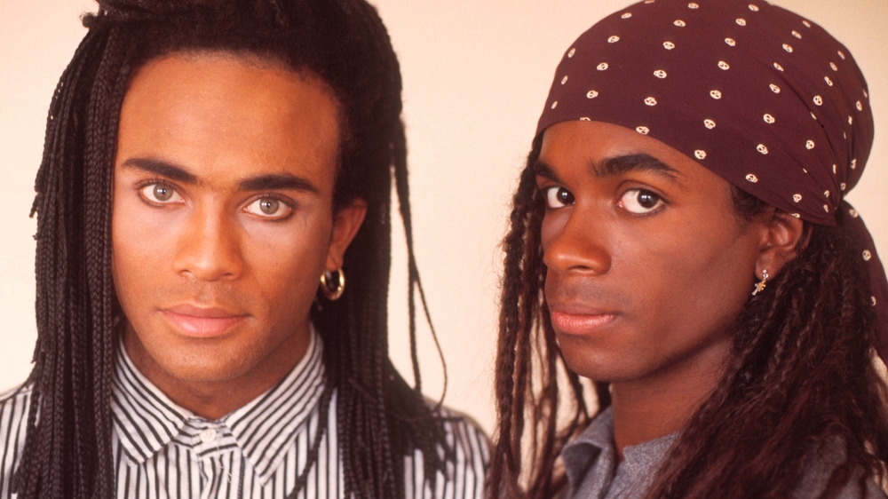 Milli Vanilli posing side-by-side