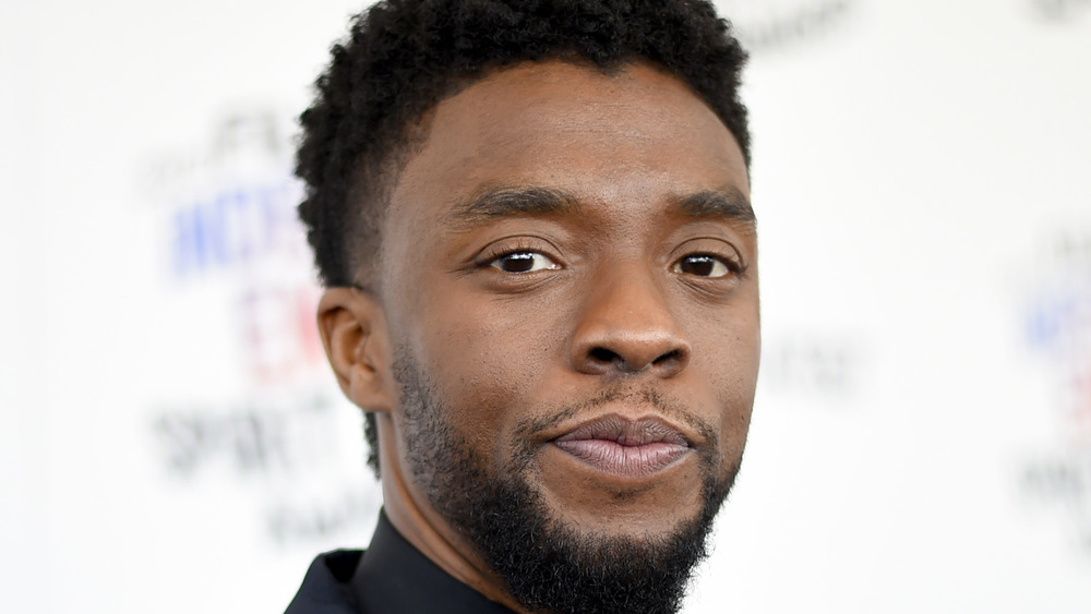 Chadwick Boseman posing at a 2018 event