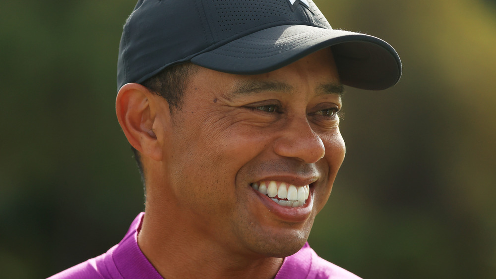 Tiger Woods smiles