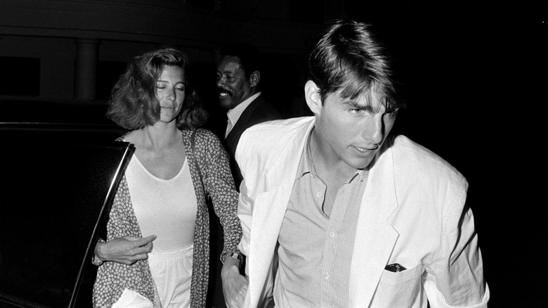 Tom Cruise and Mimi Rogers attending an event