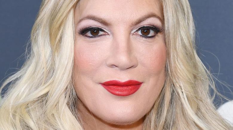 Tori Spelling looking at the camera 