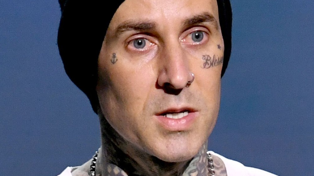 Travis Barker speaks on stage