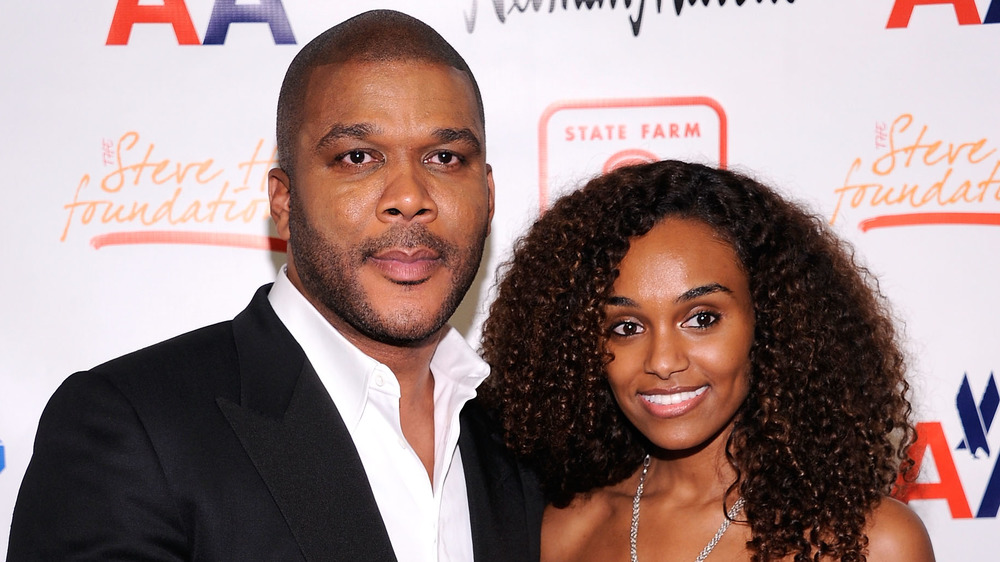 Tyler Perry and Gelila Bekele posing on a red carpet