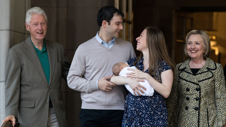 Chelsea, Mezvinsky, and the Clintons with baby Aidan