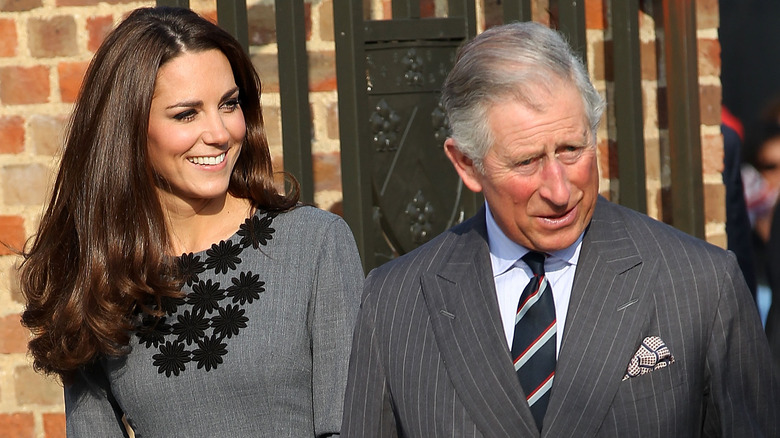 Kate Middleton and King Charles wearing gray
