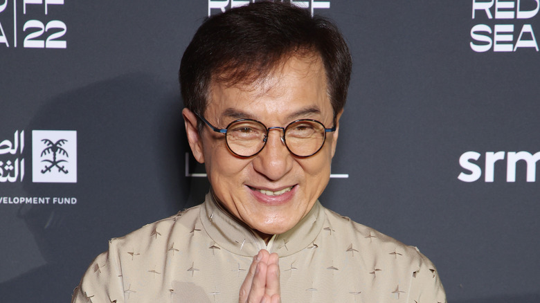 Jackie Chan posing for cameras