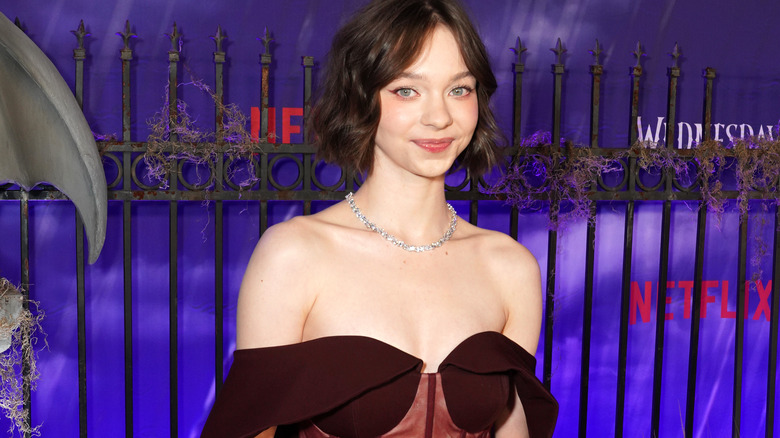 Emma Myers poses on the red carpet