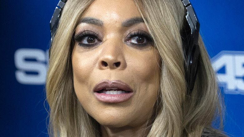 Wendy Williams wearing headphones